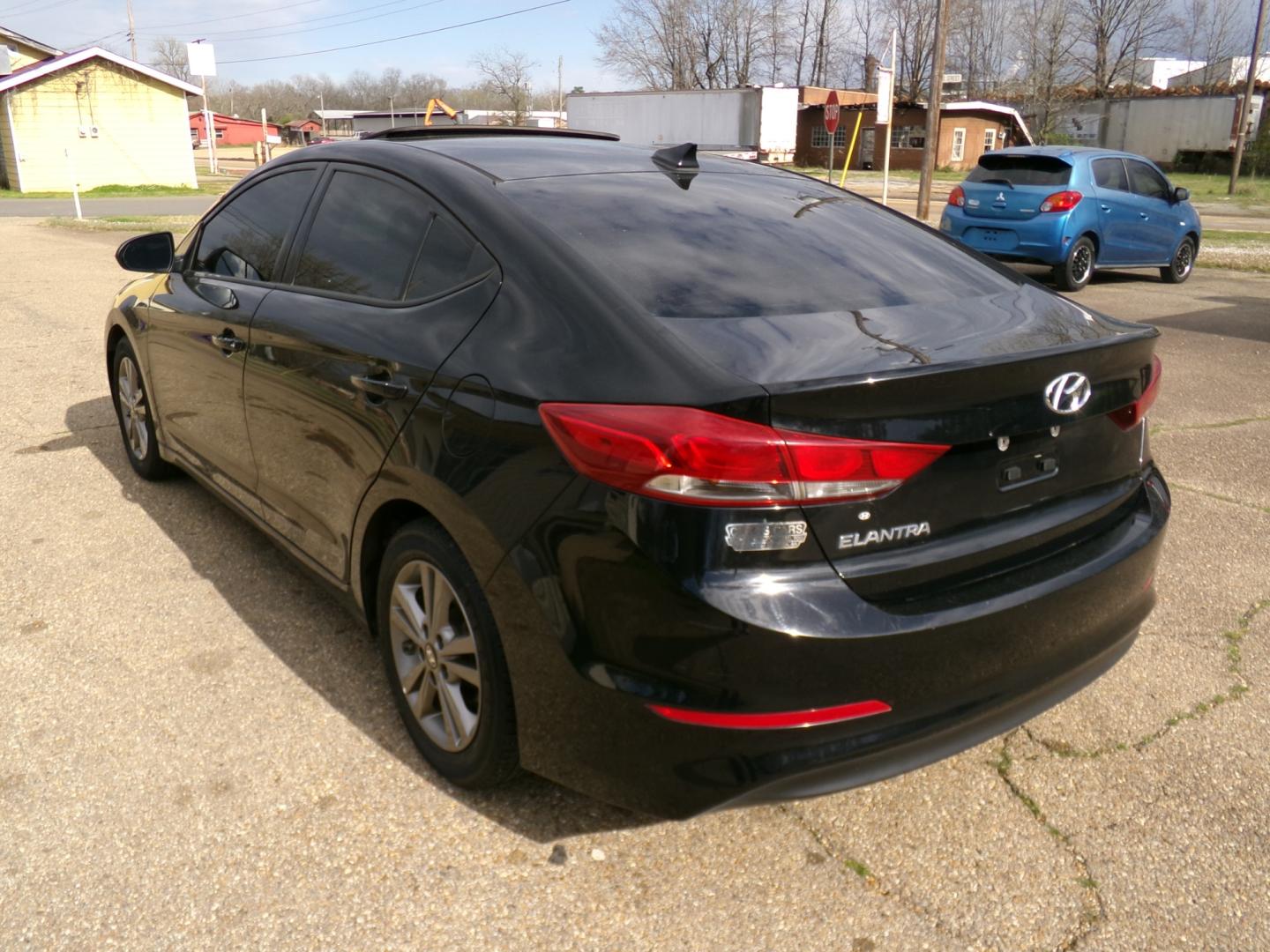 2018 Phantom Black Pearl /Gray Hyundai Elantra (5NPD84LF5JH) with an 2.0L engine, automatic transmission, located at 401 First NE, Bearden, AR, 71720, (870) 687-3414, 33.726528, -92.611519 - Photo#2